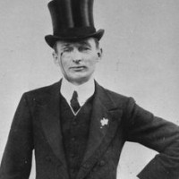 We all wear top hats and single-lens glassed with chains