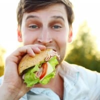 People eating on the bus